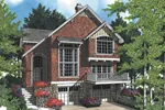 Cottage Styled Home With Deocrative Front And Brick Façade
