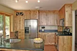 Cabin & Cottage House Plan Kitchen Photo 01 - Quailrun Rustic Acadian Home 016D-0102 - Search House Plans and More