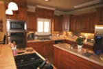 Country French House Plan Kitchen Photo 01 - Pleasant Hill Ranch Home 020D-0295 - Shop House Plans and More