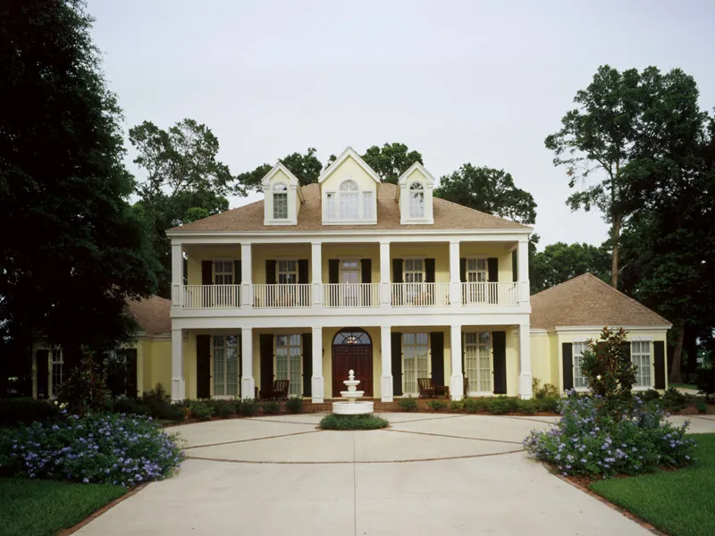 Stately Columns Adorn The Front Of This House Plan