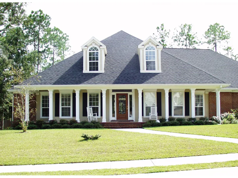 Southern Style Home With Lazy Covered Porch And Two Dormers