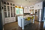 Craftsman House Plan Kitchen Photo 01 - Huntington Mills Farmhouse 032D-0523 - Search House Plans and More