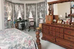 Farmhouse Plan Master Bedroom Photo 01 - Eveline Southern Farmhouse 038D-0006 - Search House Plans and More