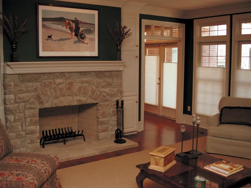 French doors access this lovely hearth room.