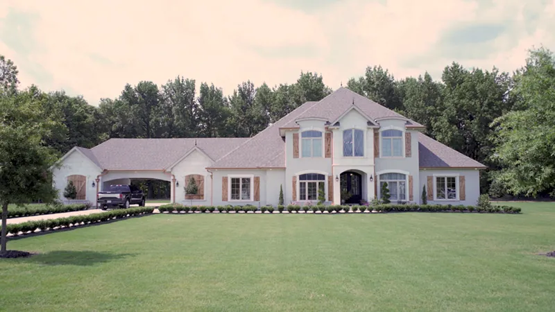 Massive Luxury Two-Story Home Has Drive Through To The Garage