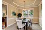 Traditional House Plan Dining Room Photo 01 - Mango Sleek Sunbelt Home 071D-0094 - Shop House Plans and More
