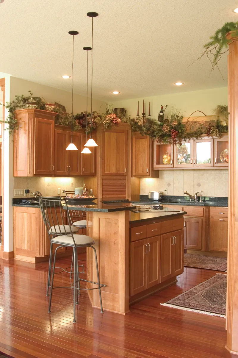 Casual country kitchen is just steps away from the cozy hearth room.