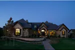 Ranch House Plan Front Night Photo 01 - Brick and Stone Home 101S-0024 | Stone Exterior Home