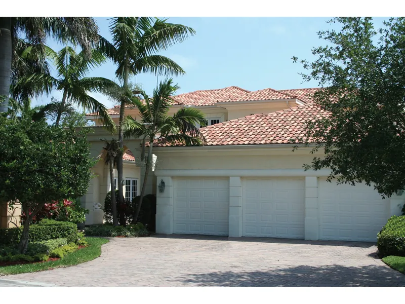 Floridian Style Stucco Home With Clay Tile Roof