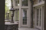 English Cottage House Plan Porch Photo 01 - Armstrong Hill Luxury Home 129S-0005 - Search House Plans and More