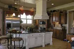 Arts & Crafts House Plan Kitchen Photo 01 - Vienna Manor Luxury Home 129S-0006 - Shop House Plans and More