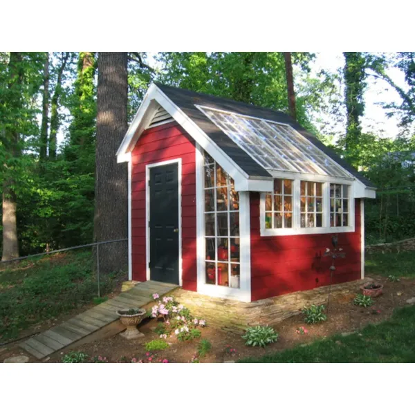 This stylish garden shed has a rustic exterior with sleek atrium windows and a French door entry