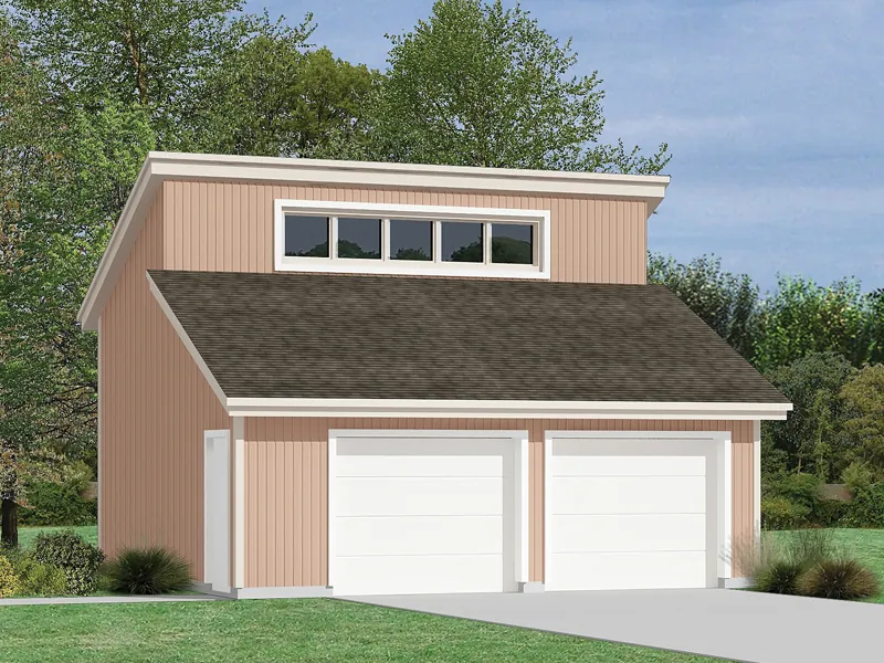 This two-car garage has several transom style windows designed into the roof perfect for a loft space above