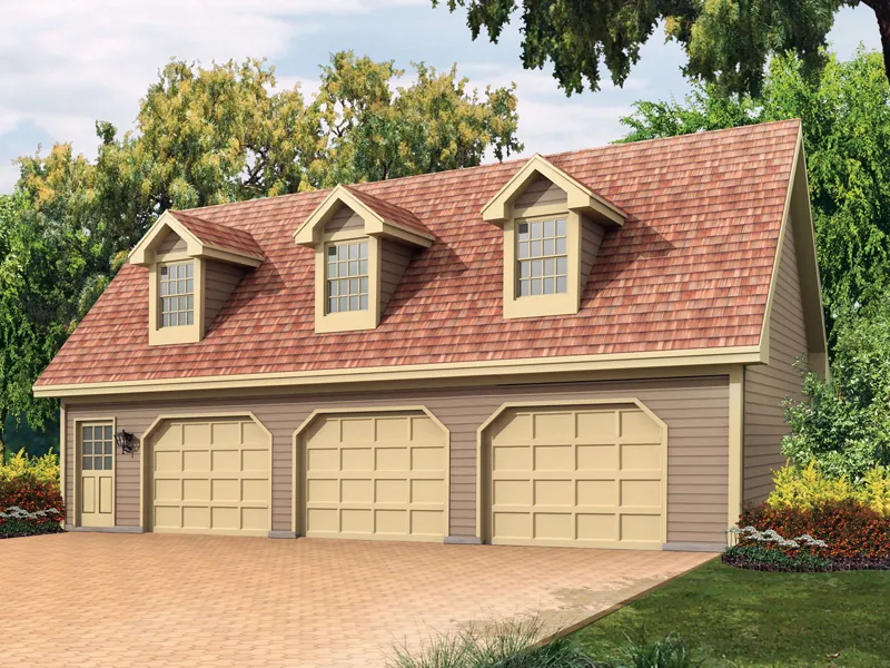 Cape Cod style three-car garage apartment with triple dormers on the roof