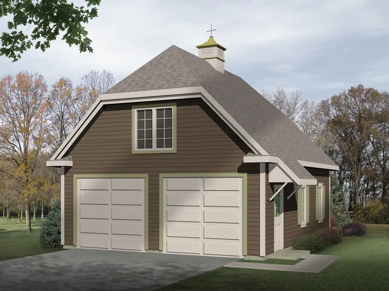 Two-car garage has Country style thanks to the hip roof design and roof cupola