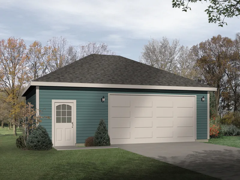 A hip roof design tops this two-car garage