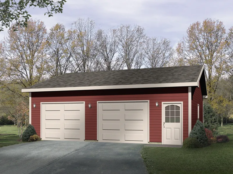 Two-car drive-through garage with front entry door