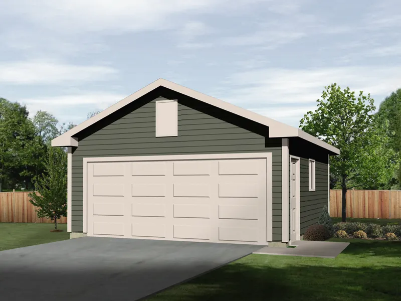 Two-car garage with gabled roof and siding exterior