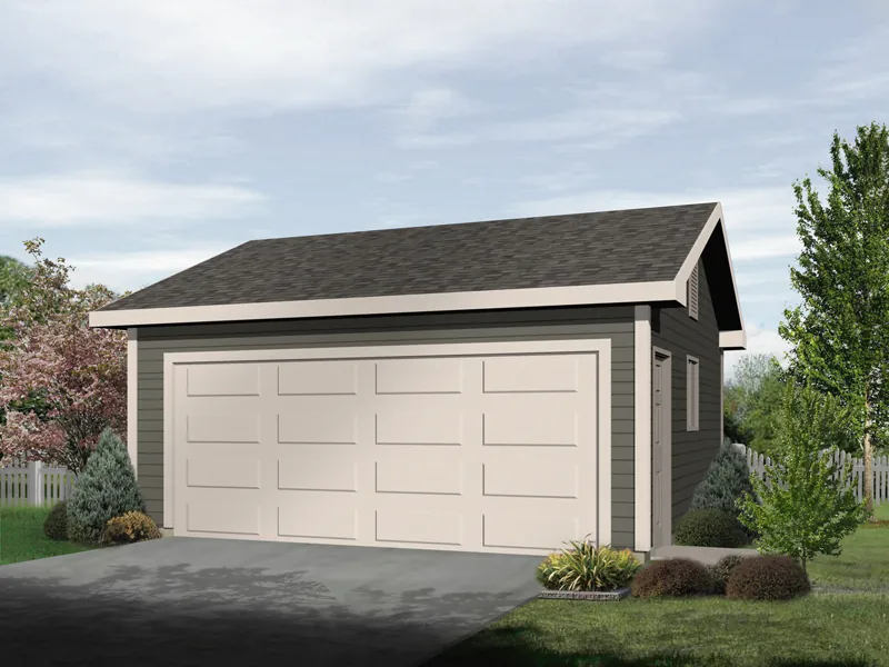 Two-car garage with one large garage door and siding exterior