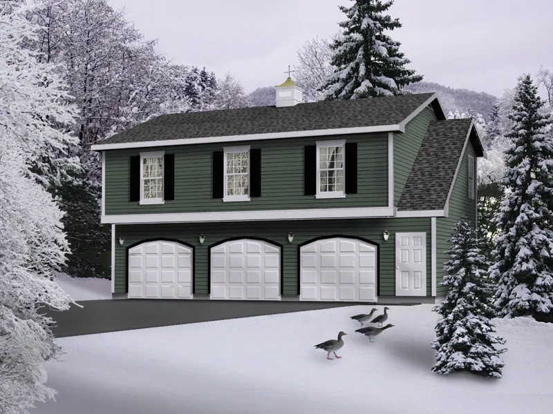 A three-car apartment garage with a colonial style influence