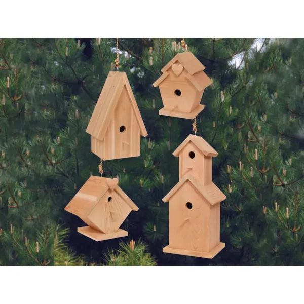 Four wooden birdhouses in multiple shapes and sizes that all look great together