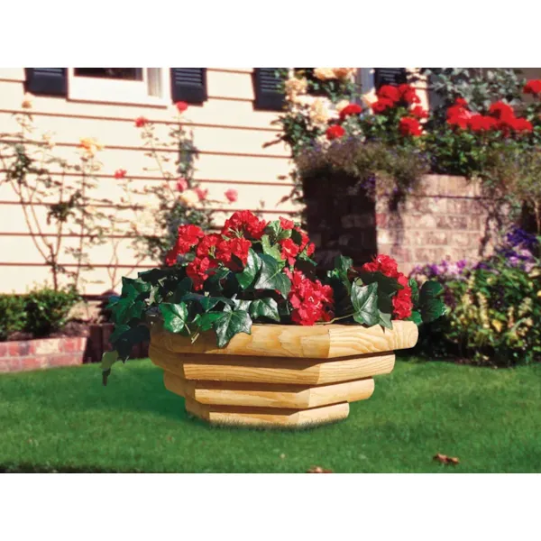 Landscape timber bowl planter makes a strong statement and has plenty of space for flowers