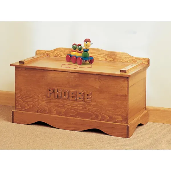 Old-fashioned wood toy chest includes a place for personalizing 