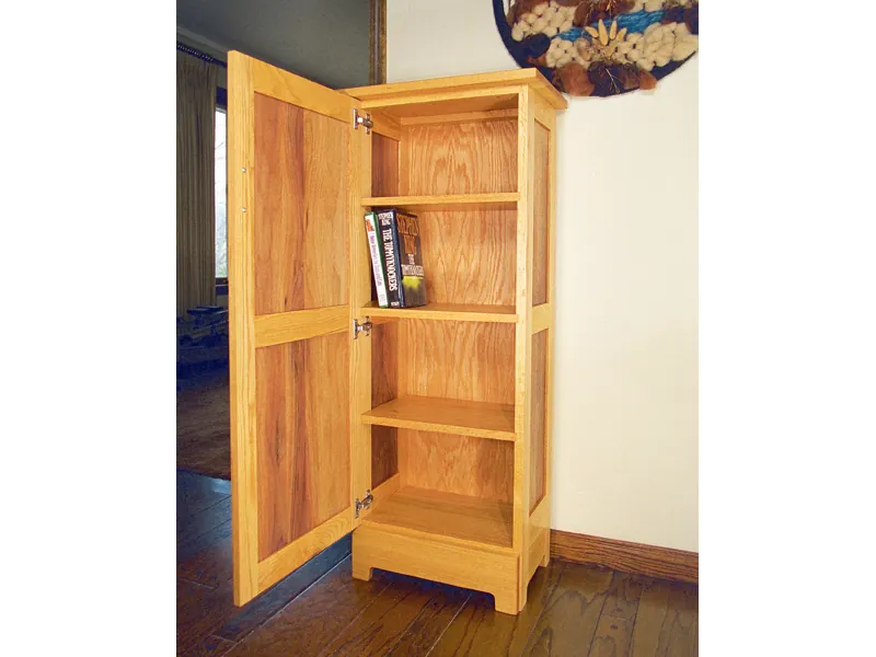All wood jelly cupboard has a door that closes across the front