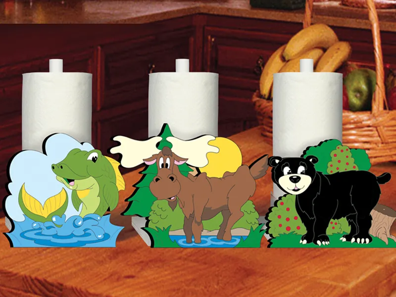 Woodland paper towel holders are decorated with a fish, moose and black bear