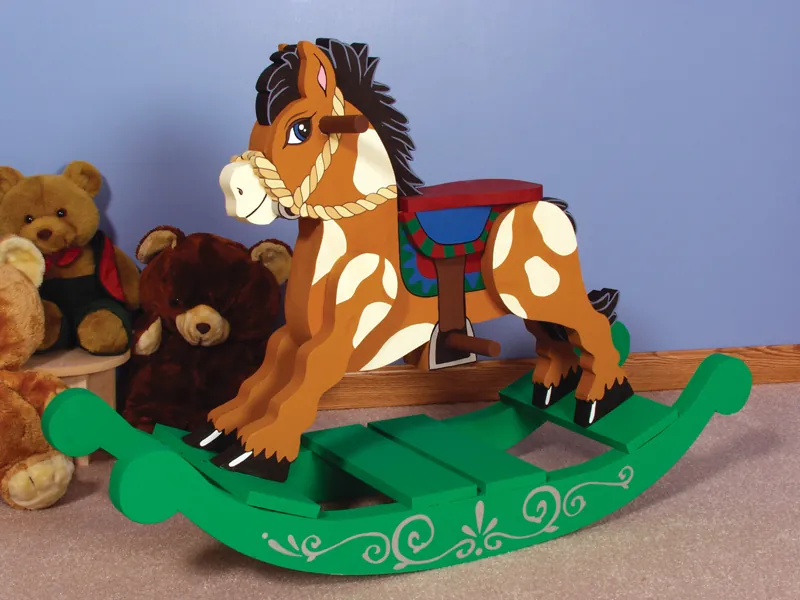 Old-fashioned rocking horse can be painted to match the décor and color scheme of your children's bedroom