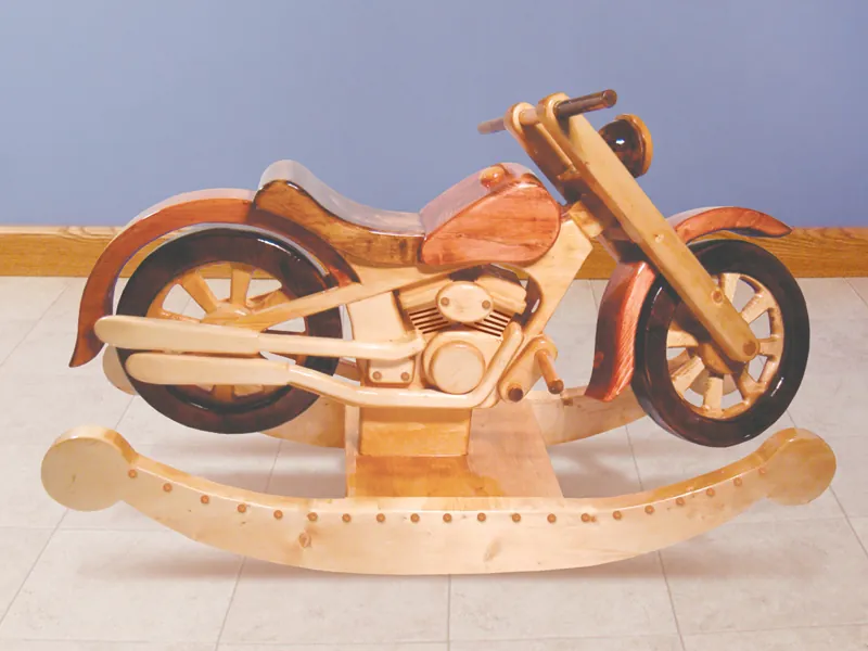 This rustic motorcycle rocker is sure to get the kids in the family excited