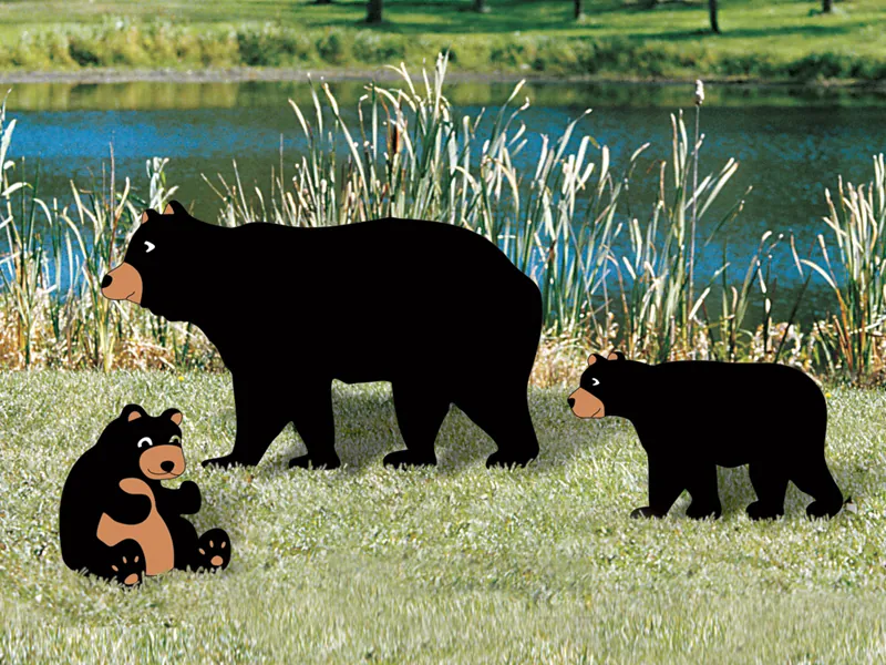 Painted bear and cubs yard art are great additions to a rustic backyard setting