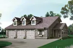 Three-Car Garage And Stonework Make A Nice Country Home