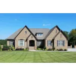 Stone Covered Two-Story Home Has Country Style And Looks Like A One-Story Style