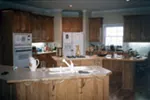 Traditional House Plan Kitchen Photo 01 - Hallberg Country Farmhouse 013D-0042 - Search House Plans and More