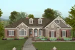 Brick Ranch Home With Multiple Gables And Inviting Front Porch