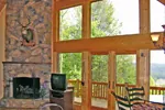 Cabin & Cottage House Plan Great Room Photo 02 - Quailrun Rustic Acadian Home 016D-0102 - Search House Plans and More