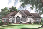 Elegant Arched Porch Mimics Arch Windows Across The Front Of This Home