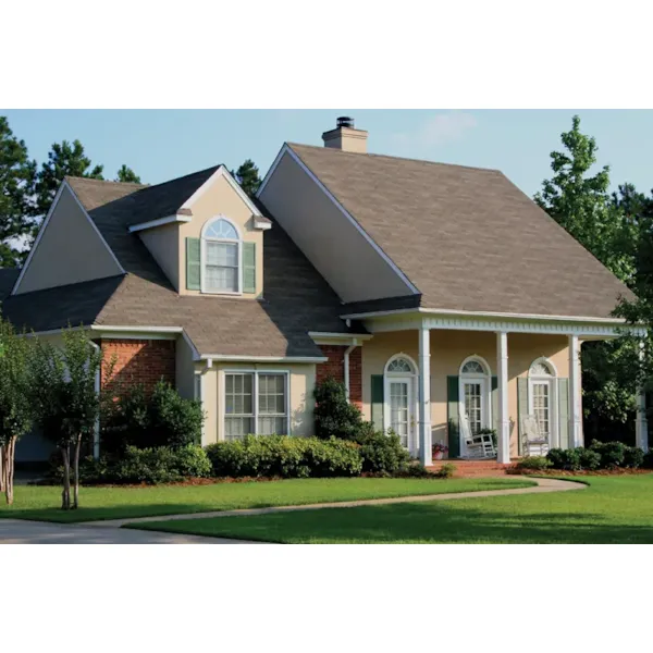 Country Style Home Has Arched Windows Across Façade And Covered Porch