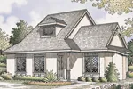 Two-Story Stucco Home With Detailed Window Design