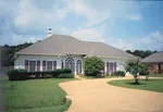 Attractive Hipped Roofed Ranch With Decorative Quoins