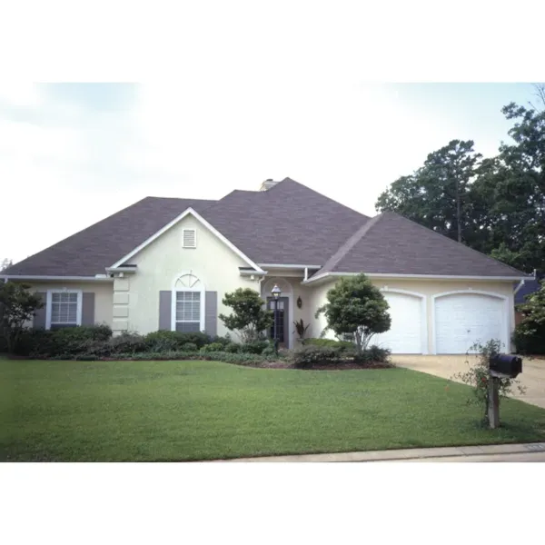 Double Front Load-In Garages Broaden This Contemporary Ranch 