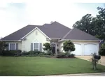 Double Front Load-In Garages Broaden This Contemporary Ranch 