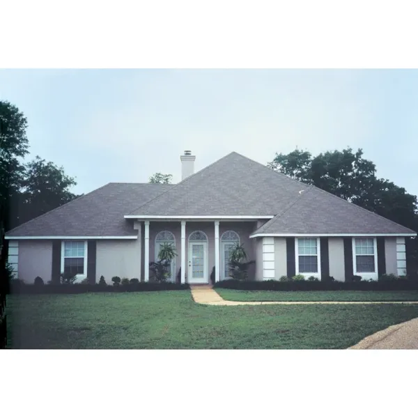 Stucco Ranch Home With Corner Decorative Quoins