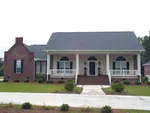 Circle-Top Windows Grace The Facade Of This Home