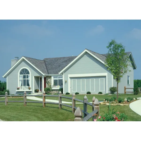 Traditional Ranch With Siding, Arch Window And Front Loading Garage