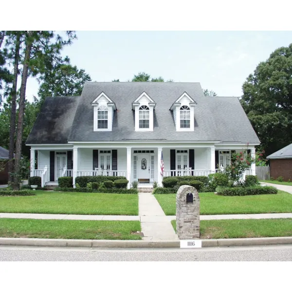 Southern Country Style Home With Three Dormers And Covered Front Porch