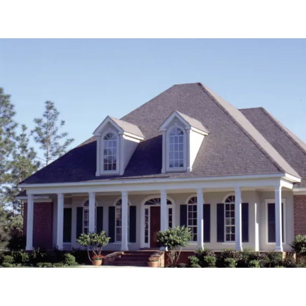 Columns Accent Facade And Frame Porch Of This Home