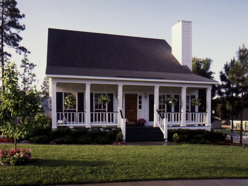 Classic Acadian Home With Beautiful Covered Front Porch