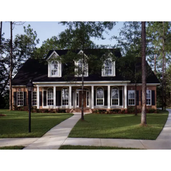 Symmetrical Southern Home With Triple Front Dormers